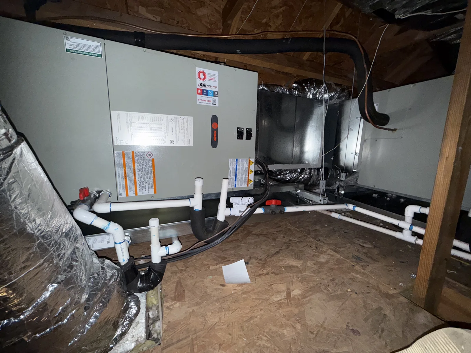 Air handler with insulated duct connections and condensate piping