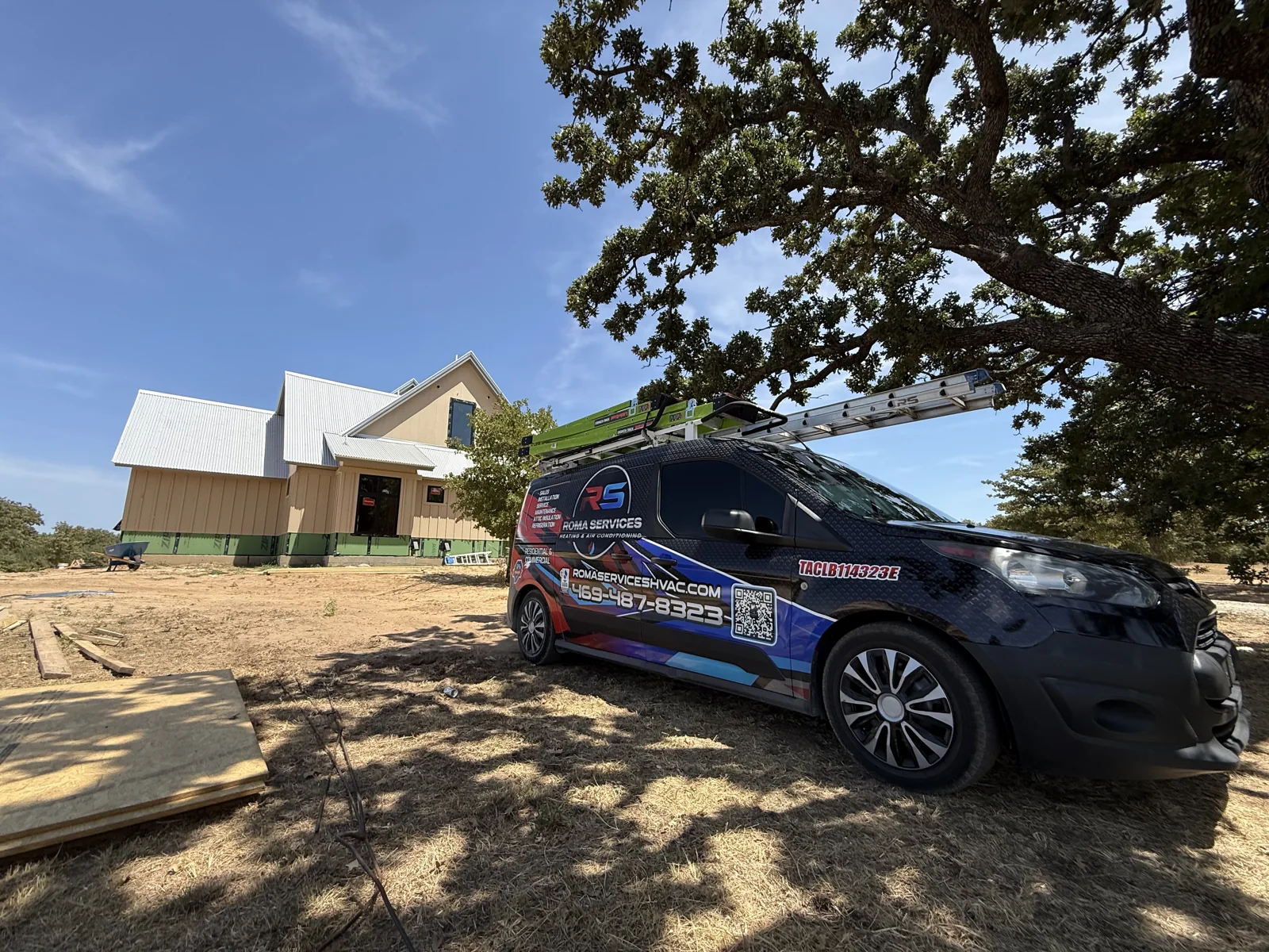 Roma Services vehicle parked outside a building